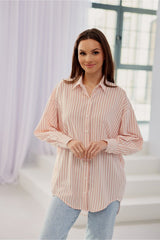 Women's striped shirt is distinguished by its oversize cut with Long sleeves