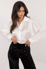 An elegant women's shirt with a classic cut with long sleeve