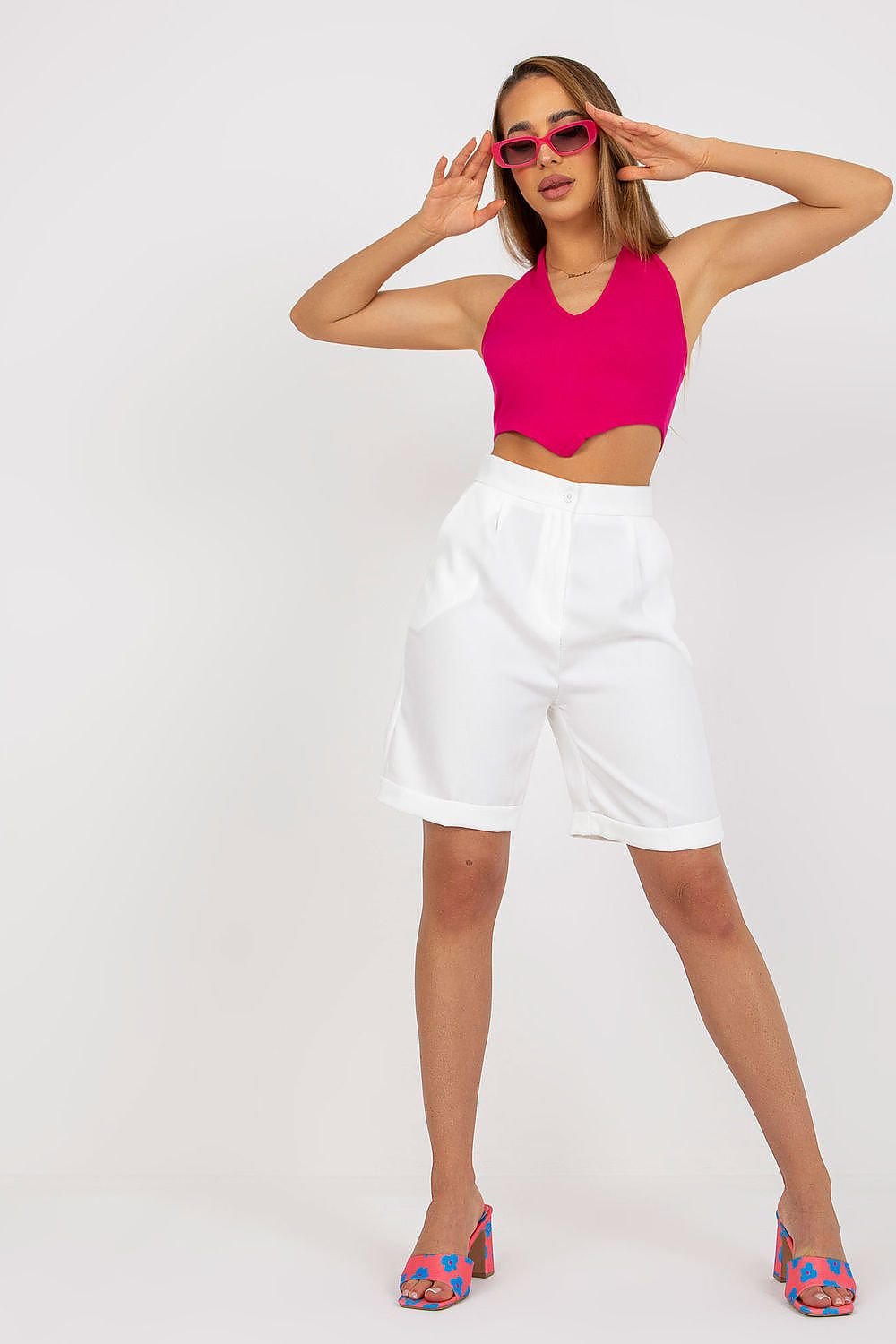 Higher-waisted shorts with zipper and button closure