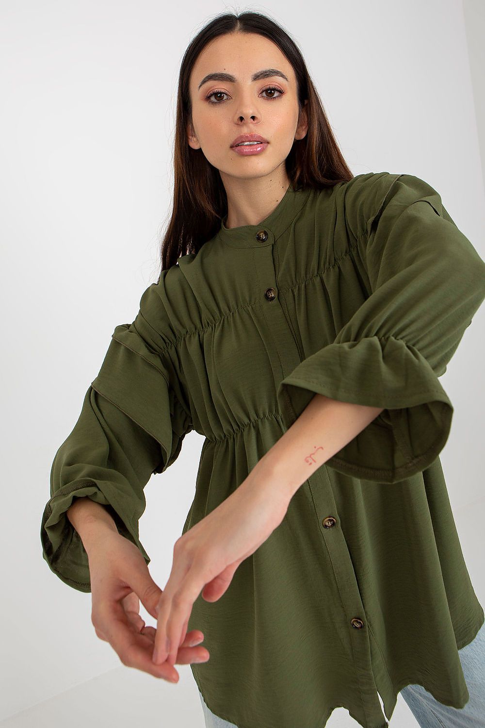 Women fashion  Long sleeve shirt with decorative ruffles.